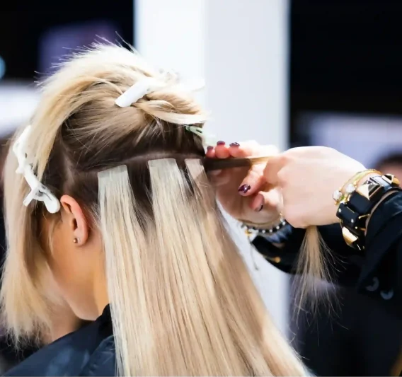 professional-hairdresser-making-hair-extensions-fo-2024-10-31-00-40-57-utc